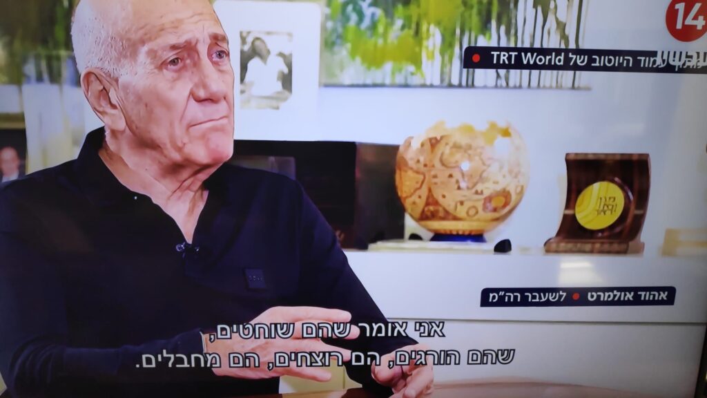 [בתמונה: אהוד אולמרט לערוץ הטורקי Trt world: "אני אומר שהם שוחטים, שהם הורגים, הם רוצחים, הם מחבלים, אני אומר את זה על השרים שלי בממשלה הישראלית". התמונה היא צילום מסך]